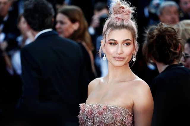 A photo of model Hailey Bieber at an event.