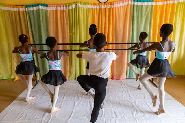 Students practice a pirouette during rehearsals at the Leap of Dance Academy in Ajangbadi, Lagos
