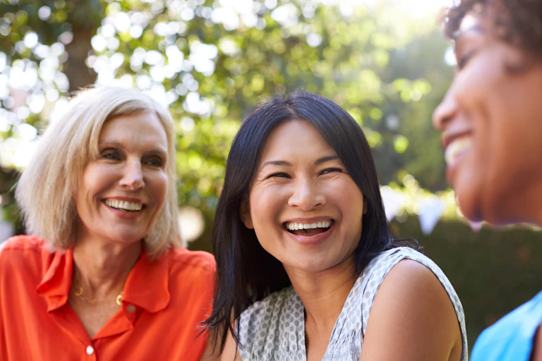 three women laughing