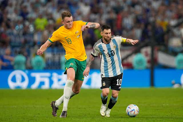 Socceroos centre-back Harry Souttar chasing Argentina's Lionel Messi
