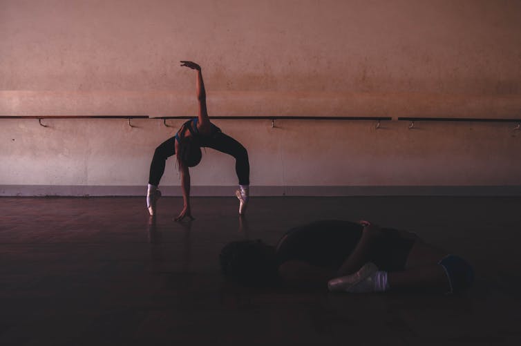 Two dancers in a studio