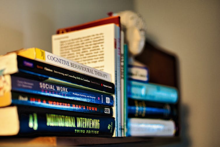 Psychology books in a pile