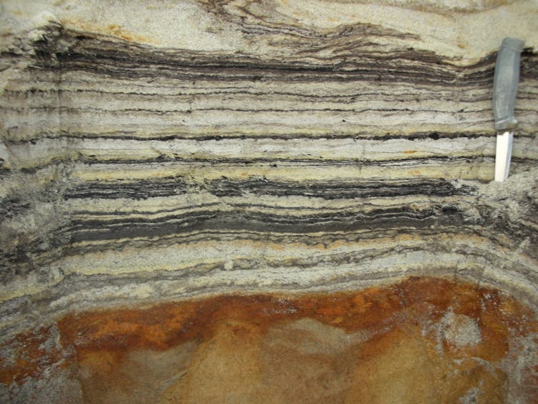 A photograph showing layers of sediment.
