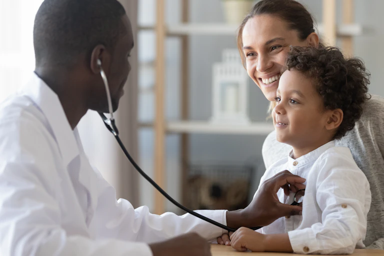 mother and child with doctor
