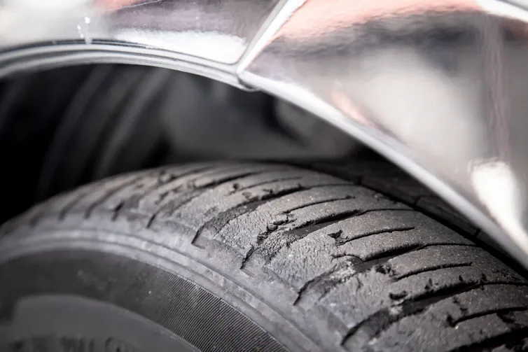 A worn down car tyre