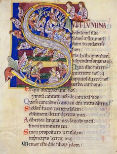 A page from an old manuscript with an elaborately decorated letter 'S.'