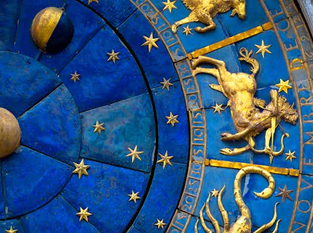 Close-up of astrological signs on the Torre dell'Orologio