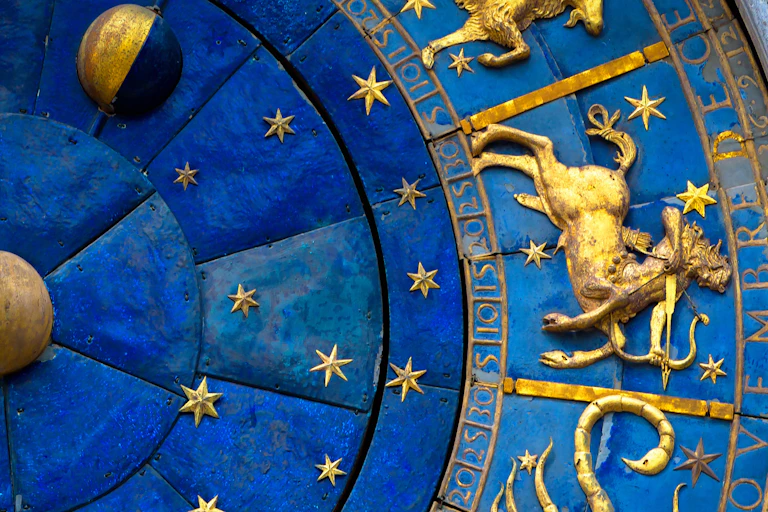 Close-up of astrological signs on the Torre dell'Orologio