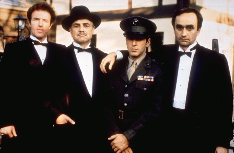 Four members of The Godfather mafia family