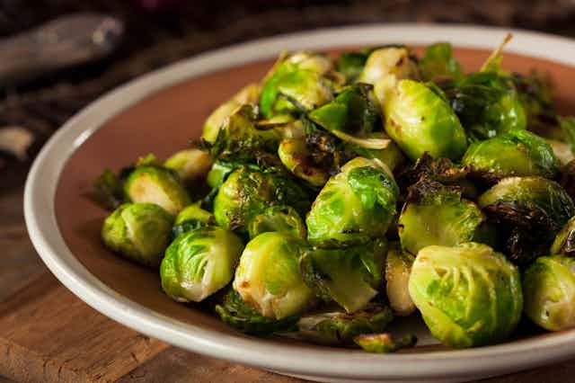 A plate of cooked brussels sprouts
