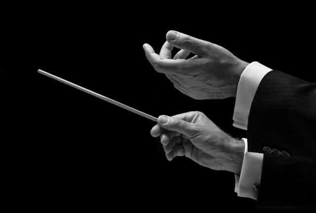 A conductor's hands