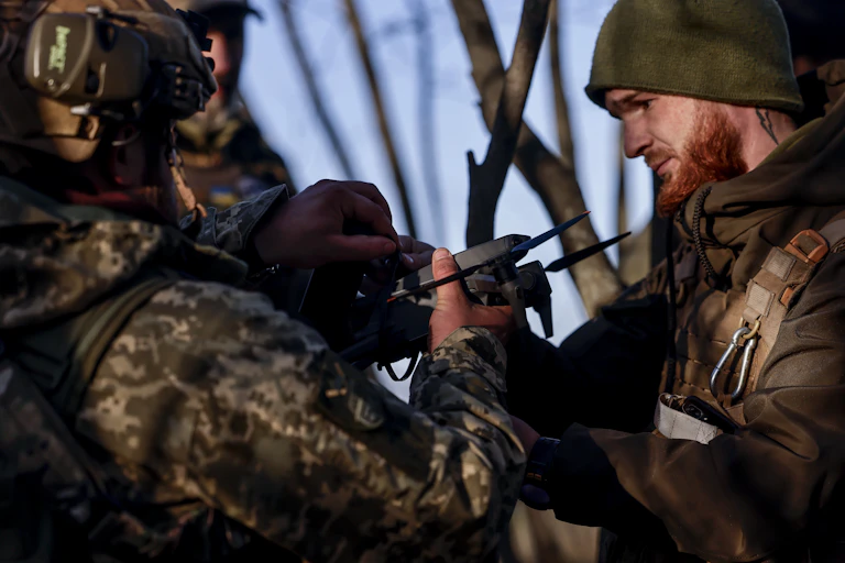 Ukrainian soldiers launch a drone at the frontline at the northern Kherson region, Ukraine, 07 November 2022.