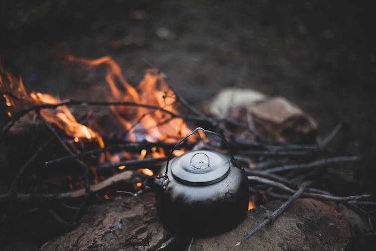 black kettle over campfire