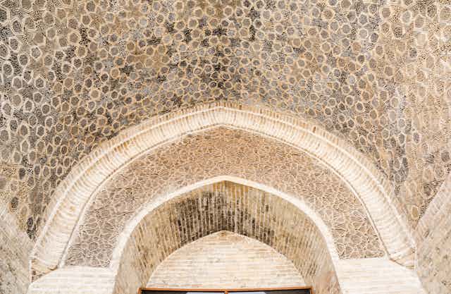 A ceiling of a building in Iraq with inscription in the old Abbasid style