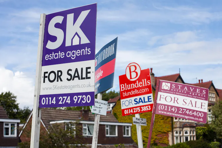 Lots of house for sale signs