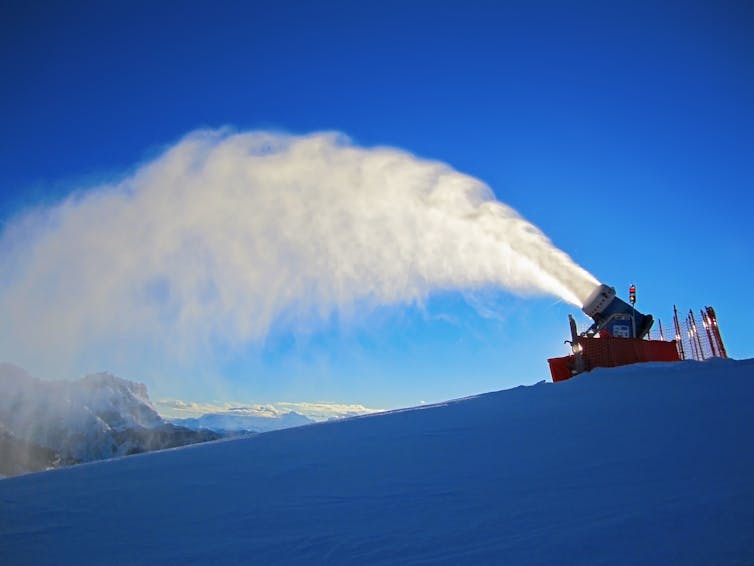 Machine pumps out snowy mist on skyline