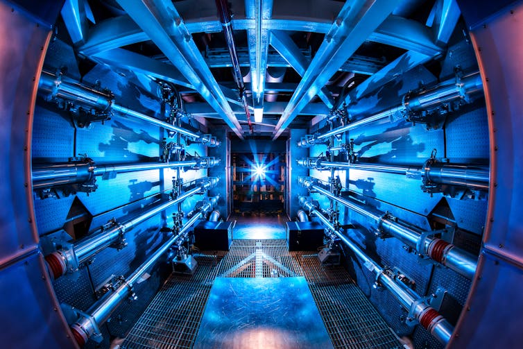 A hallway full of pipes, tubes and electronics. Why fusion ignition is a major breakthrough a physicist explains