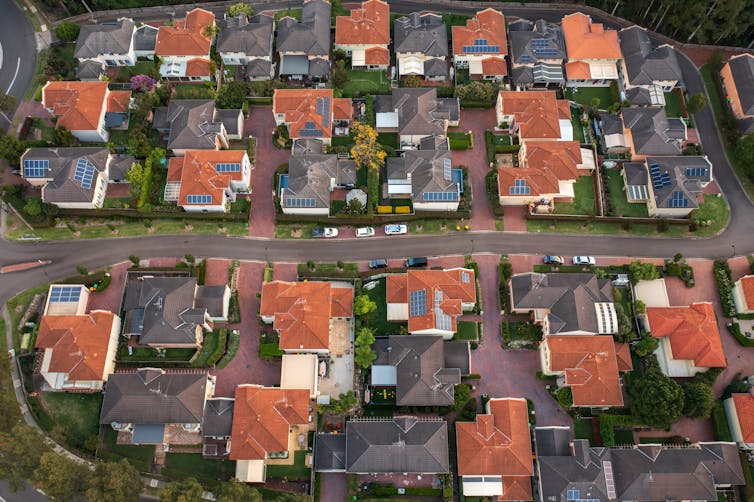 Overhead view of Australian houses showing some with rooftop solar panels