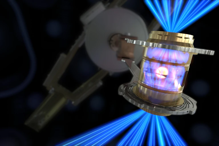 Laser energy being converted into X-rays inside a box, which compress a fuel capsule until it implodes.