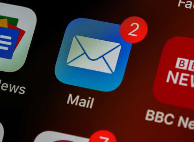 An email icon on a phone screen