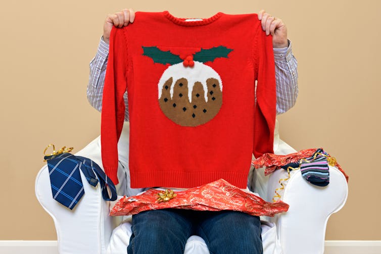 Bright sweater with Christmas Pudding motif.