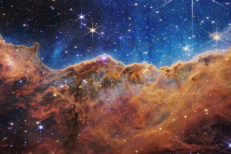 Cloud of dust against a backdrop of stars in space