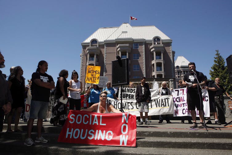 People seen at a housing protest.