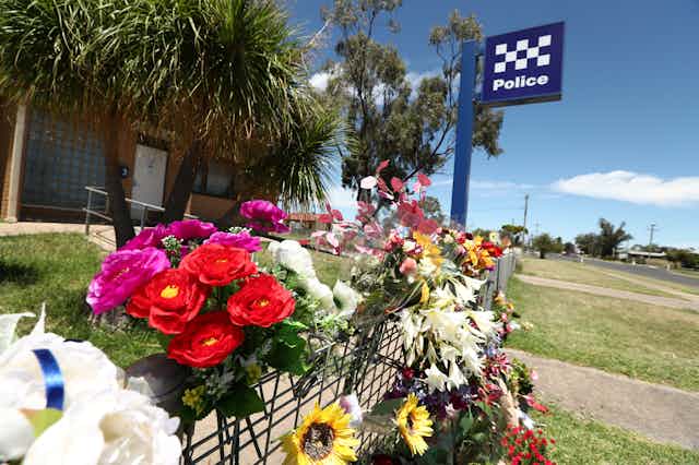 Tributes are seen at Tara Police Station in Tara, Queensland 
