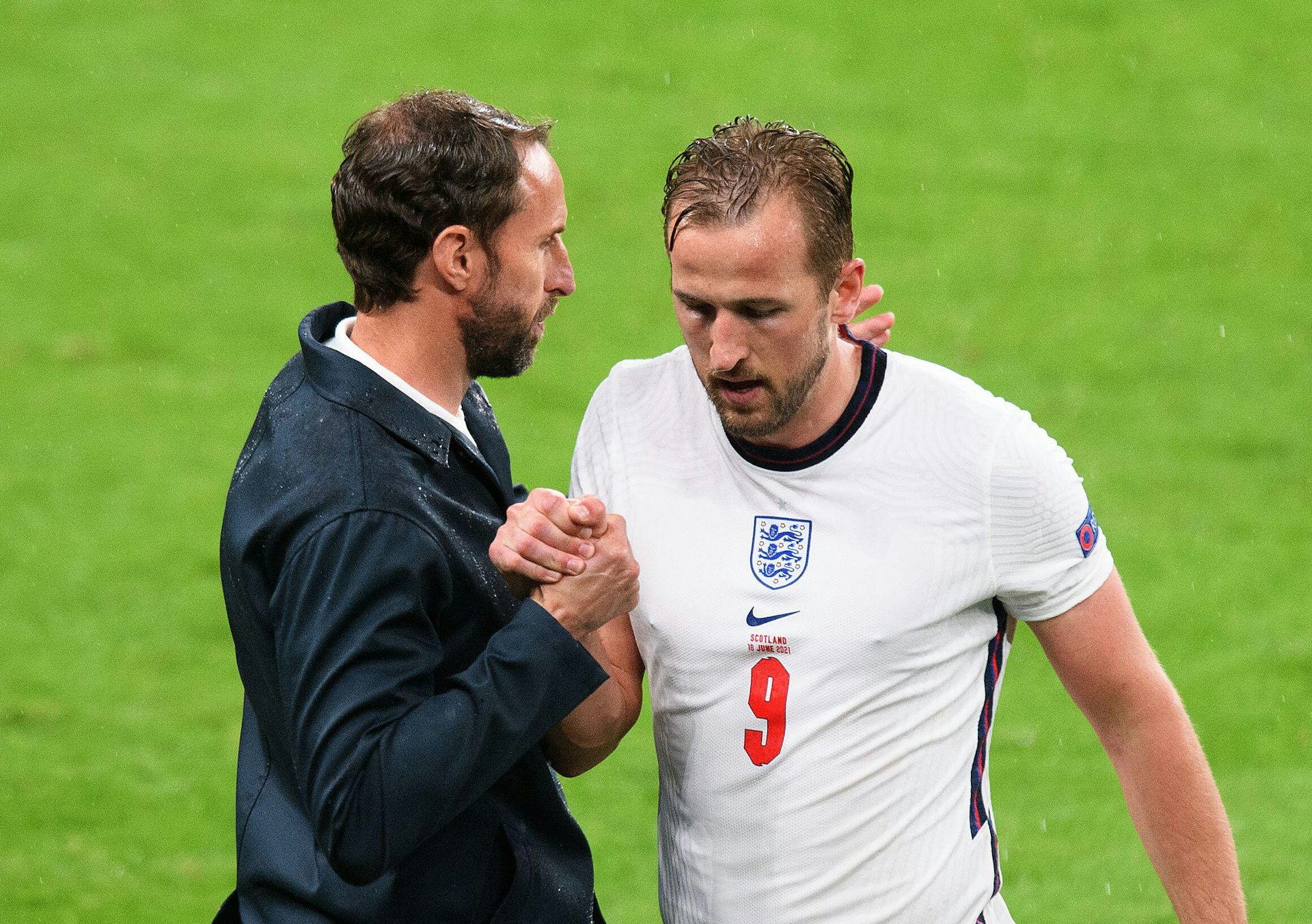 A footballer and his manager.
