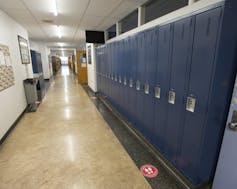 Lockers seen in a hallway.