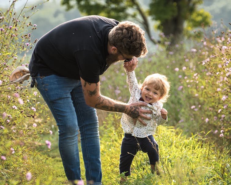 Man holds child