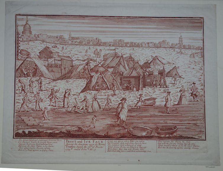 View of the frozen Thames covered with blocks of ice, looking towards buildings on the north bank including the York Buildings Water Tower and St Paul's Cathedral.