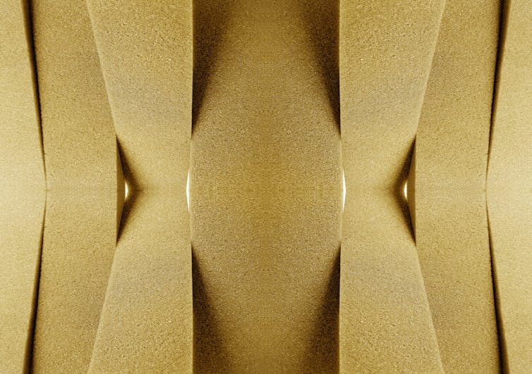 A close-up image of polyurethane foam pieces stacked vertically.