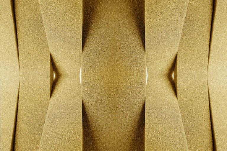 Strips of foam like that found in couch cushions in a geometric pattern.