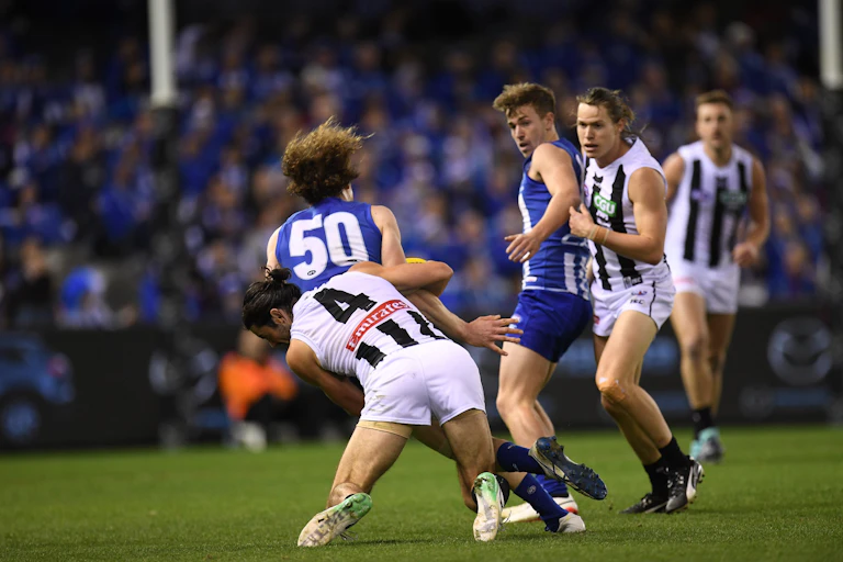 footballers on field in action