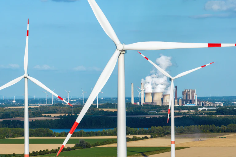 Wind turbines in front of coal station
