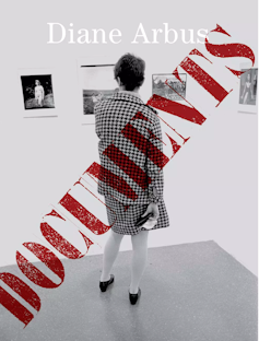A book cover showing a woman in an art gallery looking at photographs. The word 'documents' is displayed diagonally in red capitals.