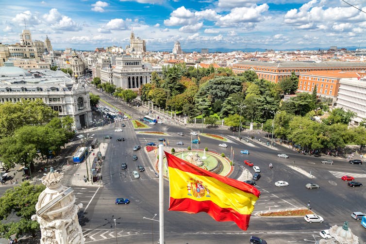 Aerial view of Cibeles fountain at Plaza de Cibeles in Madrid in a beautiful summer day, Spain