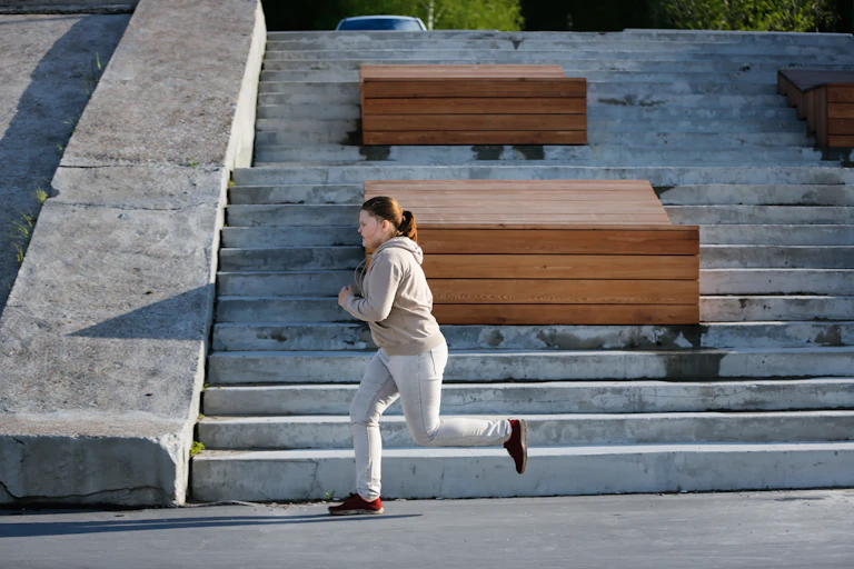 Overweight young woman jogging