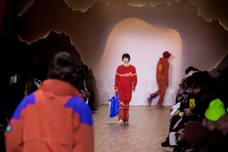 Models present Chinese designer Li Ning’s leisurewear on the runway at New York Fashion Week in 2019.