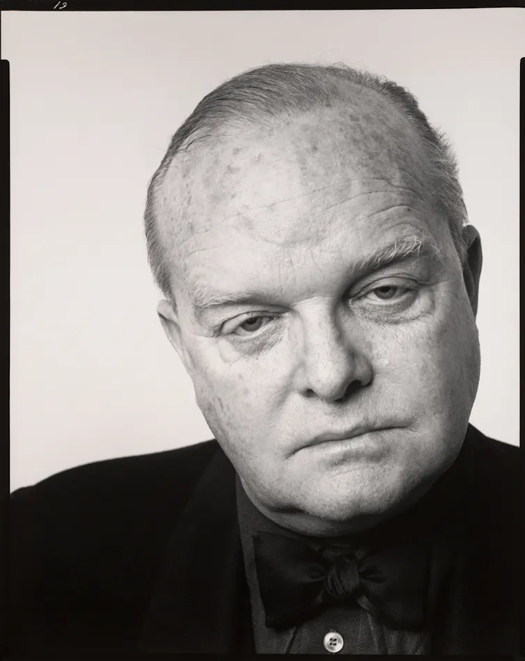 Close-up portrait of balding man.