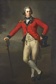 A painting of Thomas Bruce, 7th Earl of Elgin in a red jacket and white trousers. He leans on a sword and wears a powdered grey wig.