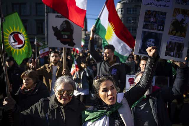 Protestors in Switzerland standing in solidarity with protestors in Iran
