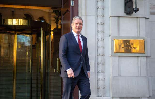 Keir Starmer leaving his offices. 