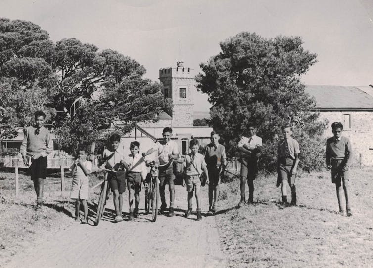 schoolboys on their way to school