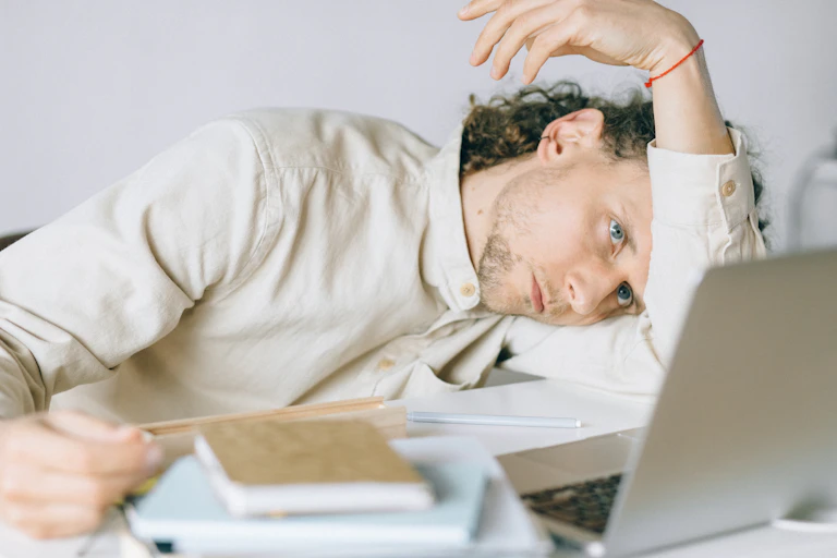 A person looks bored at work