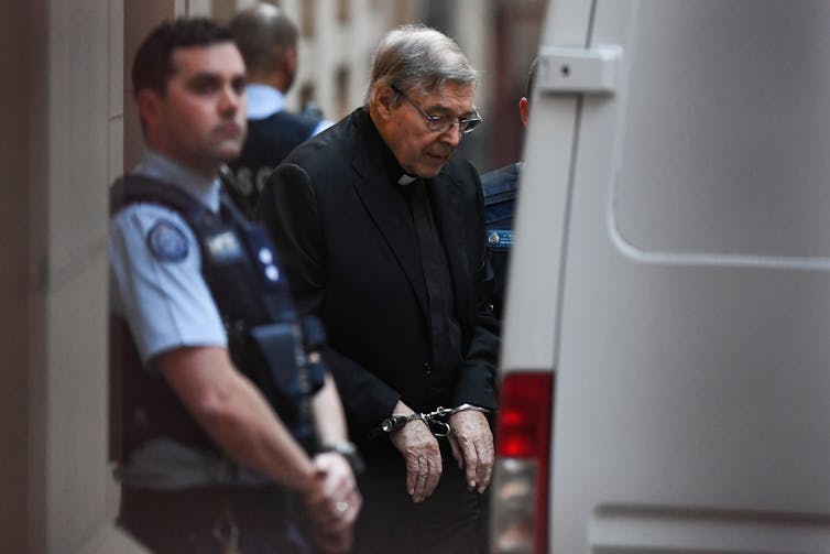 Cardinal George Pell in handcuffs leaving the Supreme Court of Victoria, June 2019.