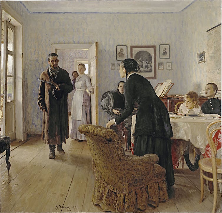 A servant shows a man into a drawing room where an older woman rises from her armchair and children sit at a table