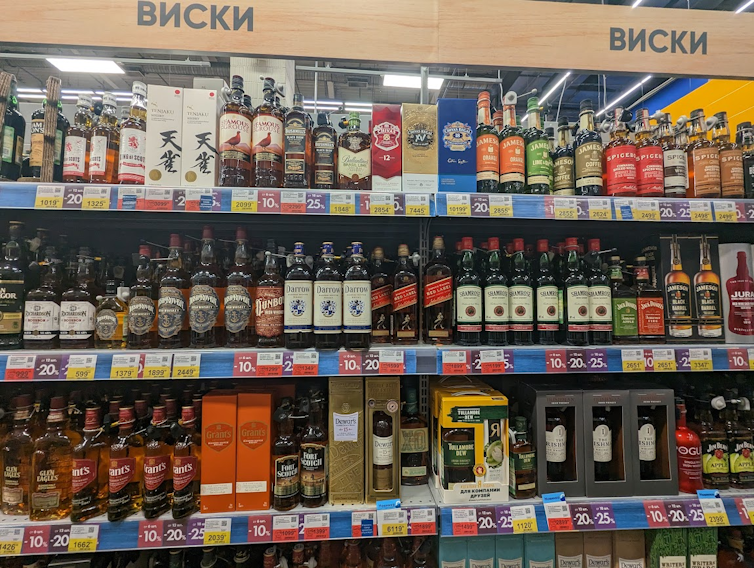 View of fully stocked supermarket shelves in Russia