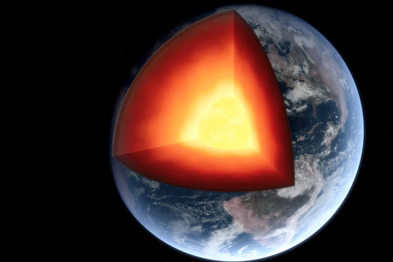 An illustration of the Earth, with a slice cut out to show a bright yellow core.